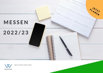Messen 2022/2023. Handy, Kalender und Block auf einem Schreibtisch.